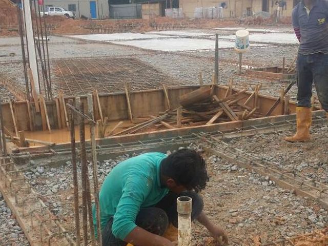 Installing a hydrant riser pipe at a construction site