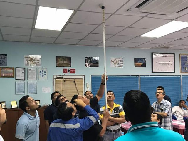 Fire safety training: smoke detector demonstration