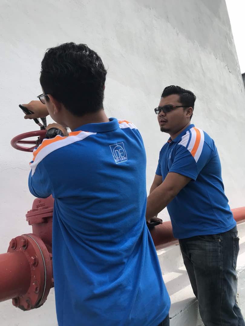 Technicians discussing a site assessment